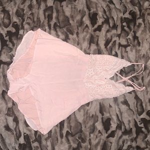 Light pink open back romper